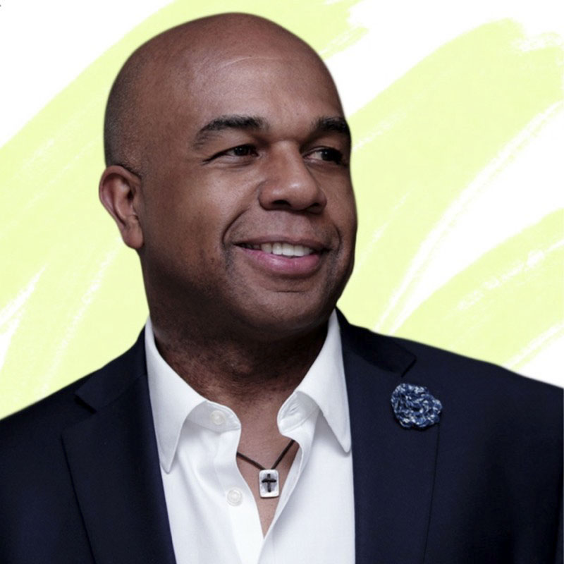 portrait image of Dr. David Butler wearing suit jacket with white collared shirt