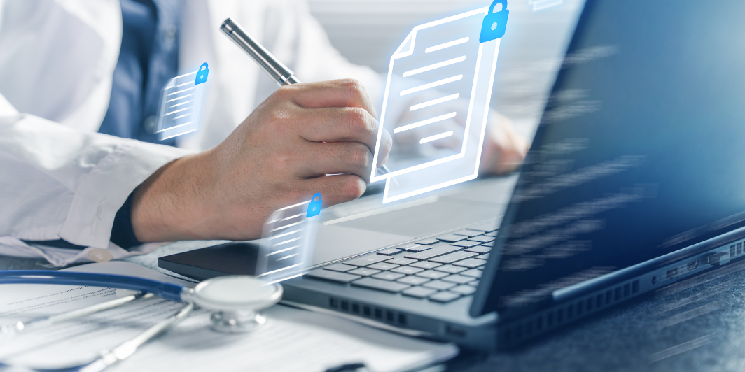 image Clinician reviewing a secure digital document on a laptop, representing secure communication in healthcare EHR workflows